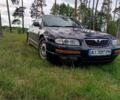 Синий Мазда Кседос 9, объемом двигателя 2.5 л и пробегом 305 тыс. км за 2219 $, фото 1 на Automoto.ua