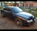 Синий Мазда Кседос 9, объемом двигателя 2.5 л и пробегом 295 тыс. км за 3399 $, фото 1 на Automoto.ua