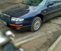 Синий Мазда Кседос 9, объемом двигателя 2.5 л и пробегом 370 тыс. км за 3300 $, фото 1 на Automoto.ua