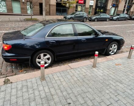 Синій Мазда Кседос 9, об'ємом двигуна 2.5 л та пробігом 251 тис. км за 2600 $, фото 1 на Automoto.ua