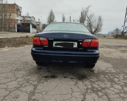 Синій Мазда Кседос 9, об'ємом двигуна 2 л та пробігом 200 тис. км за 2300 $, фото 3 на Automoto.ua