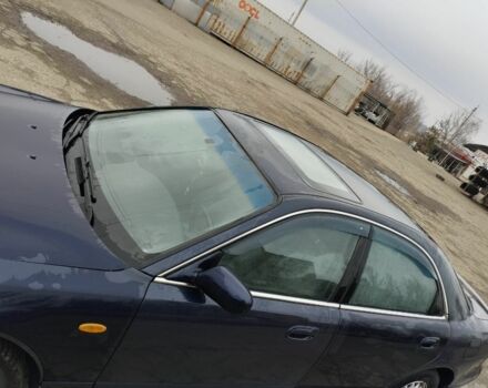 Синій Мазда Кседос 9, об'ємом двигуна 2 л та пробігом 200 тис. км за 2300 $, фото 4 на Automoto.ua