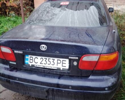 Синий Мазда Кседос 9, объемом двигателя 2.3 л и пробегом 250 тыс. км за 2200 $, фото 2 на Automoto.ua