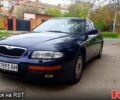Синий Мазда Кседос 9, объемом двигателя 2.3 л и пробегом 230 тыс. км за 1700 $, фото 1 на Automoto.ua