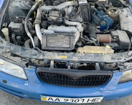 Синий Мазда Кседос 9, объемом двигателя 0 л и пробегом 200 тыс. км за 800 $, фото 17 на Automoto.ua