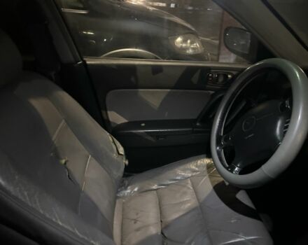 Синій Мазда Кседос 9, об'ємом двигуна 2.3 л та пробігом 3 тис. км за 2100 $, фото 2 на Automoto.ua