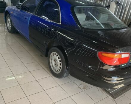 Синий Мазда Кседос 9, объемом двигателя 0 л и пробегом 200 тыс. км за 800 $, фото 3 на Automoto.ua