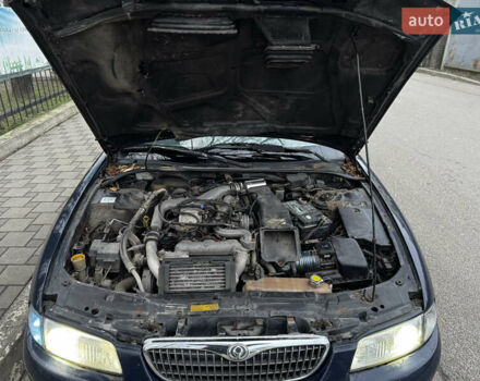 Синий Мазда Кседос 9, объемом двигателя 2.26 л и пробегом 185 тыс. км за 2200 $, фото 24 на Automoto.ua