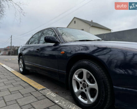 Синий Мазда Кседос 9, объемом двигателя 2.26 л и пробегом 185 тыс. км за 2200 $, фото 4 на Automoto.ua