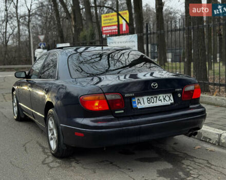 Синий Мазда Кседос 9, объемом двигателя 2.26 л и пробегом 185 тыс. км за 2200 $, фото 2 на Automoto.ua
