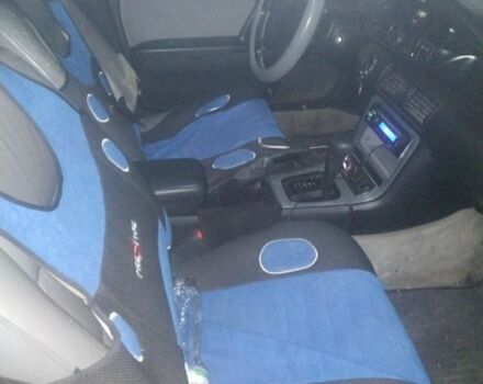Синій Мазда Кседос 9, об'ємом двигуна 2 л та пробігом 220 тис. км за 1200 $, фото 1 на Automoto.ua