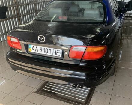 Синий Мазда Кседос 9, объемом двигателя 0 л и пробегом 200 тыс. км за 800 $, фото 4 на Automoto.ua