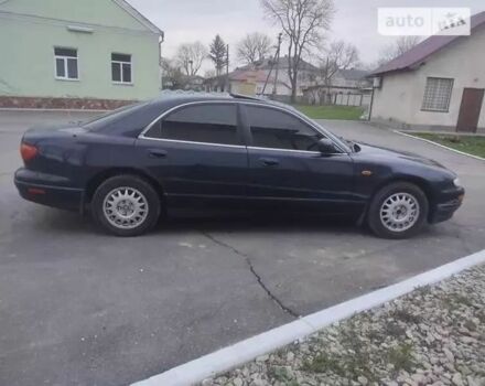 Синий Мазда Кседос 9, объемом двигателя 2.3 л и пробегом 250 тыс. км за 2200 $, фото 5 на Automoto.ua