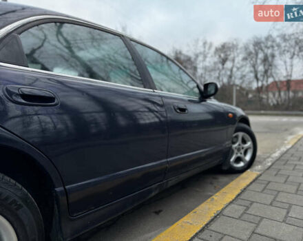 Синий Мазда Кседос 9, объемом двигателя 2.26 л и пробегом 185 тыс. км за 2200 $, фото 8 на Automoto.ua