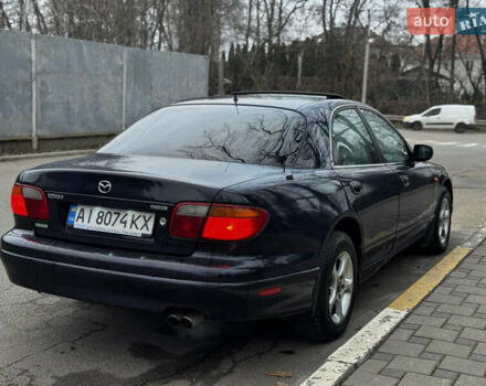 Синий Мазда Кседос 9, объемом двигателя 2.26 л и пробегом 185 тыс. км за 2200 $, фото 1 на Automoto.ua