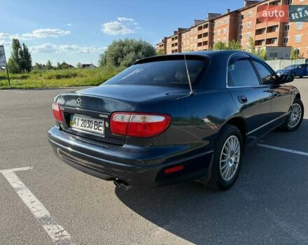 Синий Мазда Кседос 9, объемом двигателя 2.5 л и пробегом 285 тыс. км за 3200 $, фото 78 на Automoto.ua