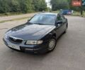 Синий Мазда Кседос 9, объемом двигателя 2.5 л и пробегом 249 тыс. км за 3950 $, фото 1 на Automoto.ua