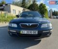 Синий Мазда Кседос 9, объемом двигателя 2.5 л и пробегом 285 тыс. км за 3200 $, фото 83 на Automoto.ua