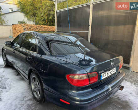 Синий Мазда Кседос 9, объемом двигателя 2.5 л и пробегом 288 тыс. км за 3500 $, фото 2 на Automoto.ua