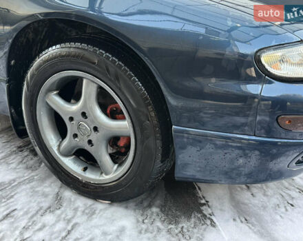 Синий Мазда Кседос 9, объемом двигателя 2.5 л и пробегом 288 тыс. км за 3500 $, фото 6 на Automoto.ua