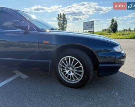 Синий Мазда Кседос 9, объемом двигателя 2.5 л и пробегом 285 тыс. км за 3200 $, фото 80 на Automoto.ua