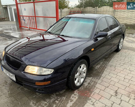 Синій Мазда Кседос 9, об'ємом двигуна 2 л та пробігом 272 тис. км за 1950 $, фото 1 на Automoto.ua