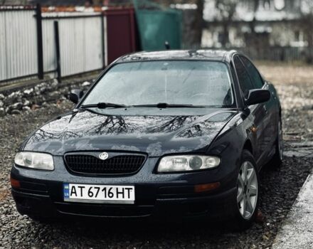 Синий Мазда Кседос 9, объемом двигателя 2 л и пробегом 407 тыс. км за 1275 $, фото 1 на Automoto.ua