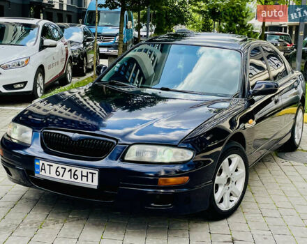Синій Мазда Кседос 9, об'ємом двигуна 2 л та пробігом 405 тис. км за 1600 $, фото 1 на Automoto.ua