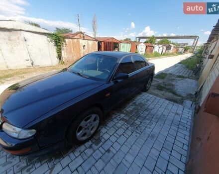 Синий Мазда Кседос 9, объемом двигателя 2.5 л и пробегом 350 тыс. км за 1600 $, фото 1 на Automoto.ua