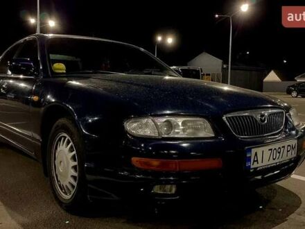 Синий Мазда Кседос 9, объемом двигателя 2.5 л и пробегом 380 тыс. км за 2100 $, фото 1 на Automoto.ua