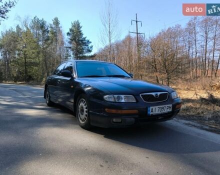 Синий Мазда Кседос 9, объемом двигателя 2.5 л и пробегом 380 тыс. км за 2000 $, фото 1 на Automoto.ua