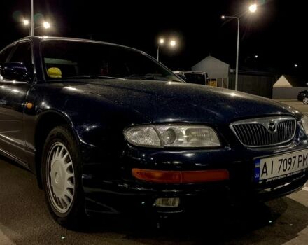 Синий Мазда Кседос 9, объемом двигателя 2.5 л и пробегом 385 тыс. км за 2200 $, фото 1 на Automoto.ua