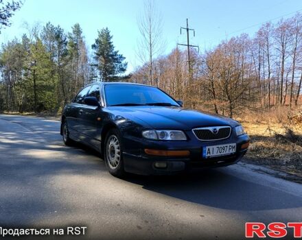 Синий Мазда Кседос 9, объемом двигателя 2.5 л и пробегом 300 тыс. км за 2500 $, фото 1 на Automoto.ua