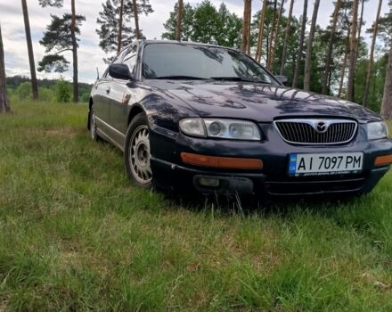 Синий Мазда Кседос 9, объемом двигателя 2.5 л и пробегом 305 тыс. км за 2219 $, фото 1 на Automoto.ua