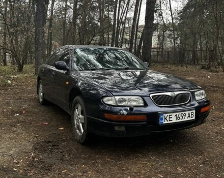 Синий Мазда Кседос 9, объемом двигателя 2.5 л и пробегом 397 тыс. км за 2400 $, фото 1 на Automoto.ua