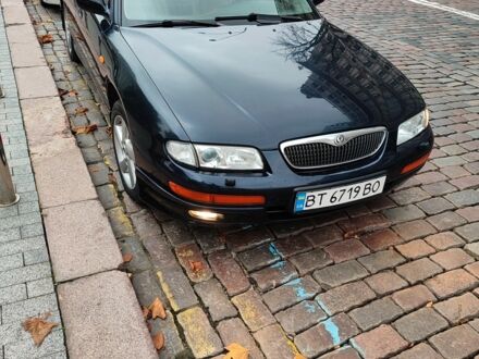 Синій Мазда Кседос 9, об'ємом двигуна 2.5 л та пробігом 251 тис. км за 2600 $, фото 1 на Automoto.ua