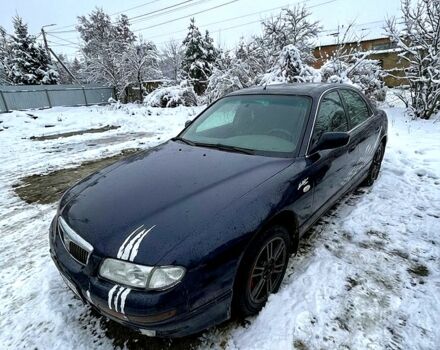 Синий Мазда Кседос 9, объемом двигателя 2.5 л и пробегом 0 тыс. км за 1700 $, фото 1 на Automoto.ua