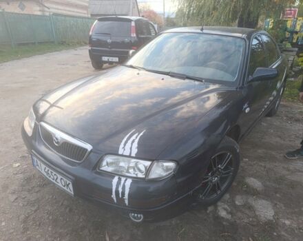 Синий Мазда Кседос 9, объемом двигателя 2.5 л и пробегом 294 тыс. км за 2300 $, фото 1 на Automoto.ua