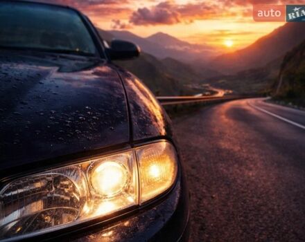 Синий Мазда Кседос 9, объемом двигателя 2.5 л и пробегом 297 тыс. км за 2500 $, фото 1 на Automoto.ua