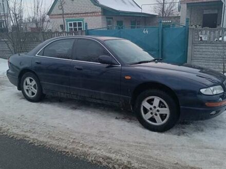 Синий Мазда Кседос 9, объемом двигателя 2.5 л и пробегом 350 тыс. км за 1650 $, фото 1 на Automoto.ua