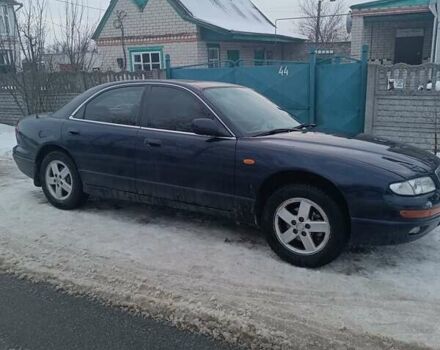 Синий Мазда Кседос 9, объемом двигателя 2.5 л и пробегом 350 тыс. км за 1650 $, фото 1 на Automoto.ua