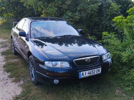 Синий Мазда Кседос 9, объемом двигателя 2.5 л и пробегом 288 тыс. км за 2700 $, фото 1 на Automoto.ua