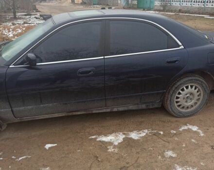 Синий Мазда Кседос 9, объемом двигателя 2.3 л и пробегом 322 тыс. км за 2300 $, фото 1 на Automoto.ua