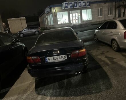 Синій Мазда Кседос 9, об'ємом двигуна 2.3 л та пробігом 3 тис. км за 2100 $, фото 1 на Automoto.ua