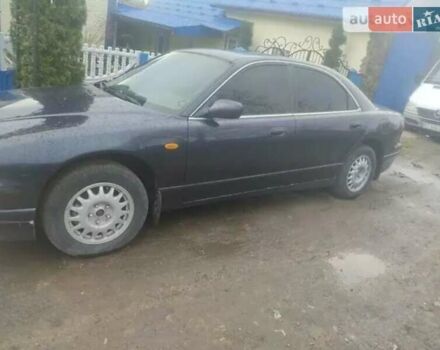 Синий Мазда Кседос 9, объемом двигателя 2.3 л и пробегом 297 тыс. км за 3000 $, фото 1 на Automoto.ua