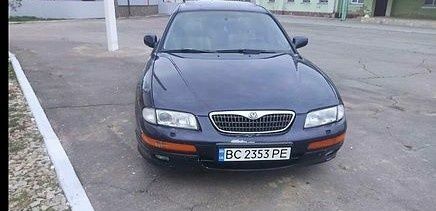 Синій Мазда Кседос 9, об'ємом двигуна 2.3 л та пробігом 250 тис. км за 2200 $, фото 1 на Automoto.ua