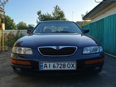 Синий Мазда Кседос 9, объемом двигателя 2.3 л и пробегом 1 тыс. км за 2200 $, фото 1 на Automoto.ua