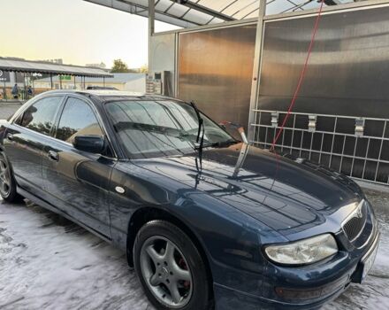 Синій Мазда Кседос 9, об'ємом двигуна 2.5 л та пробігом 288 тис. км за 3600 $, фото 1 на Automoto.ua