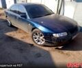 Зеленый Мазда Кседос 9, объемом двигателя 2 л и пробегом 250 тыс. км за 1100 $, фото 1 на Automoto.ua
