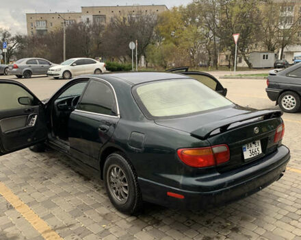 Зелений Мазда Кседос 9, об'ємом двигуна 2.5 л та пробігом 394 тис. км за 2200 $, фото 9 на Automoto.ua